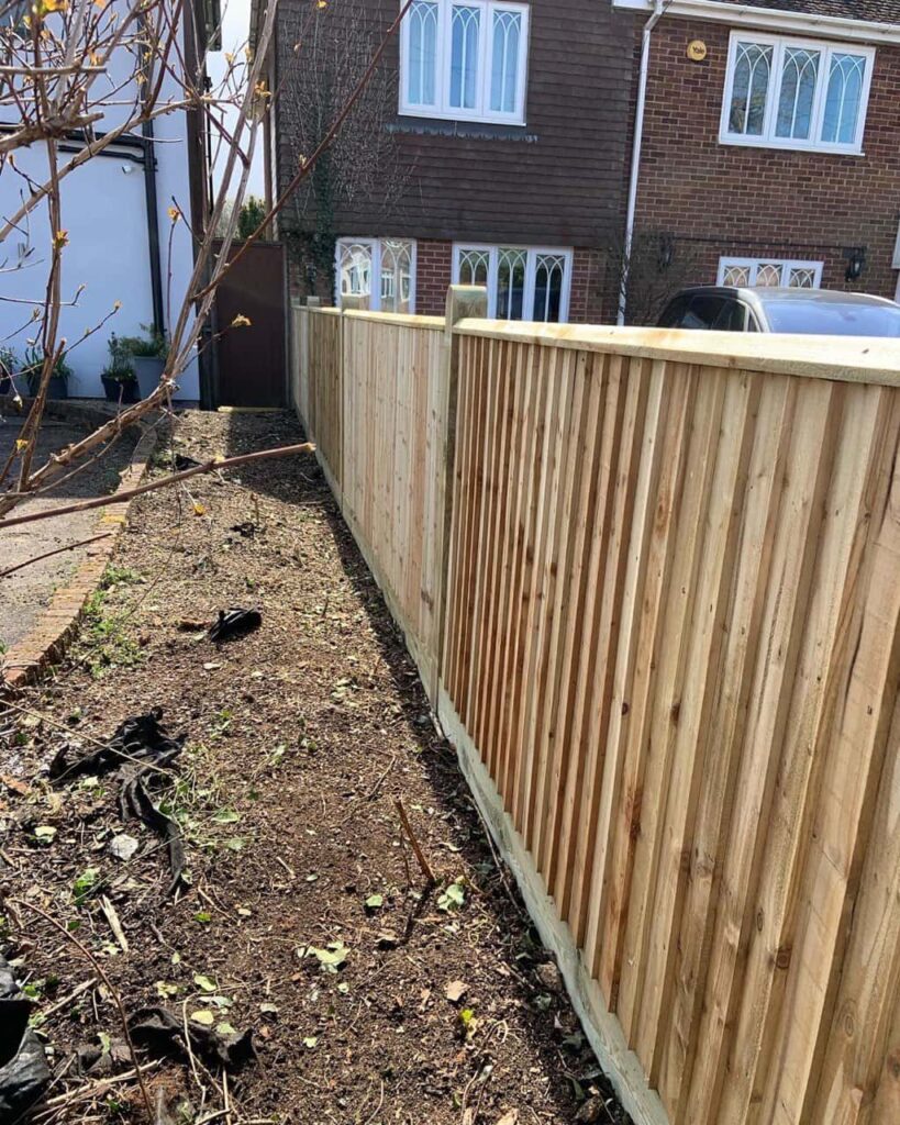 This is a photo of feather edge fencing installed in a residential property by Fast Fix Fencing Waterbeach