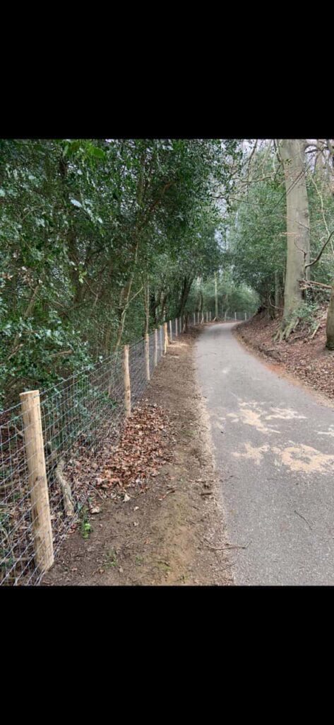 This is a photo of stock fencing installed along the side of a country road. By Fast Fix Fencing Waterbeach